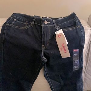 Levi mid rise 711 skinny jeans.